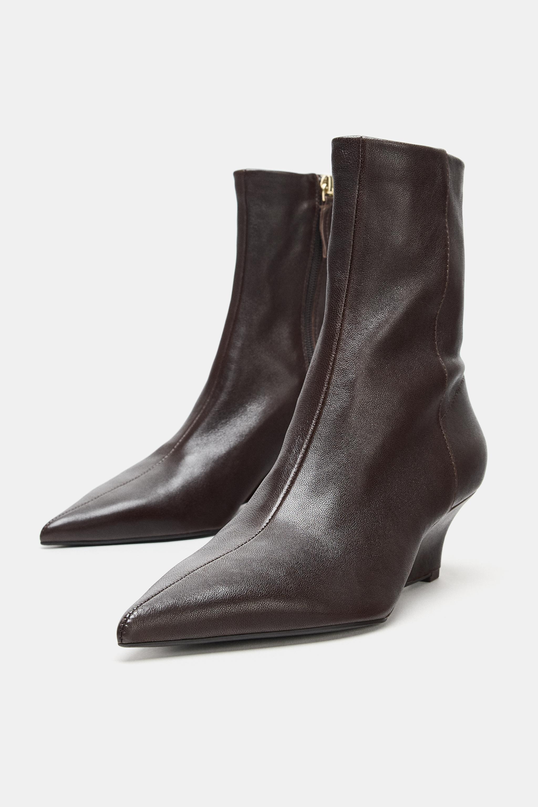 BOTTINES EN CUIR À TALONS COMPENSÉS