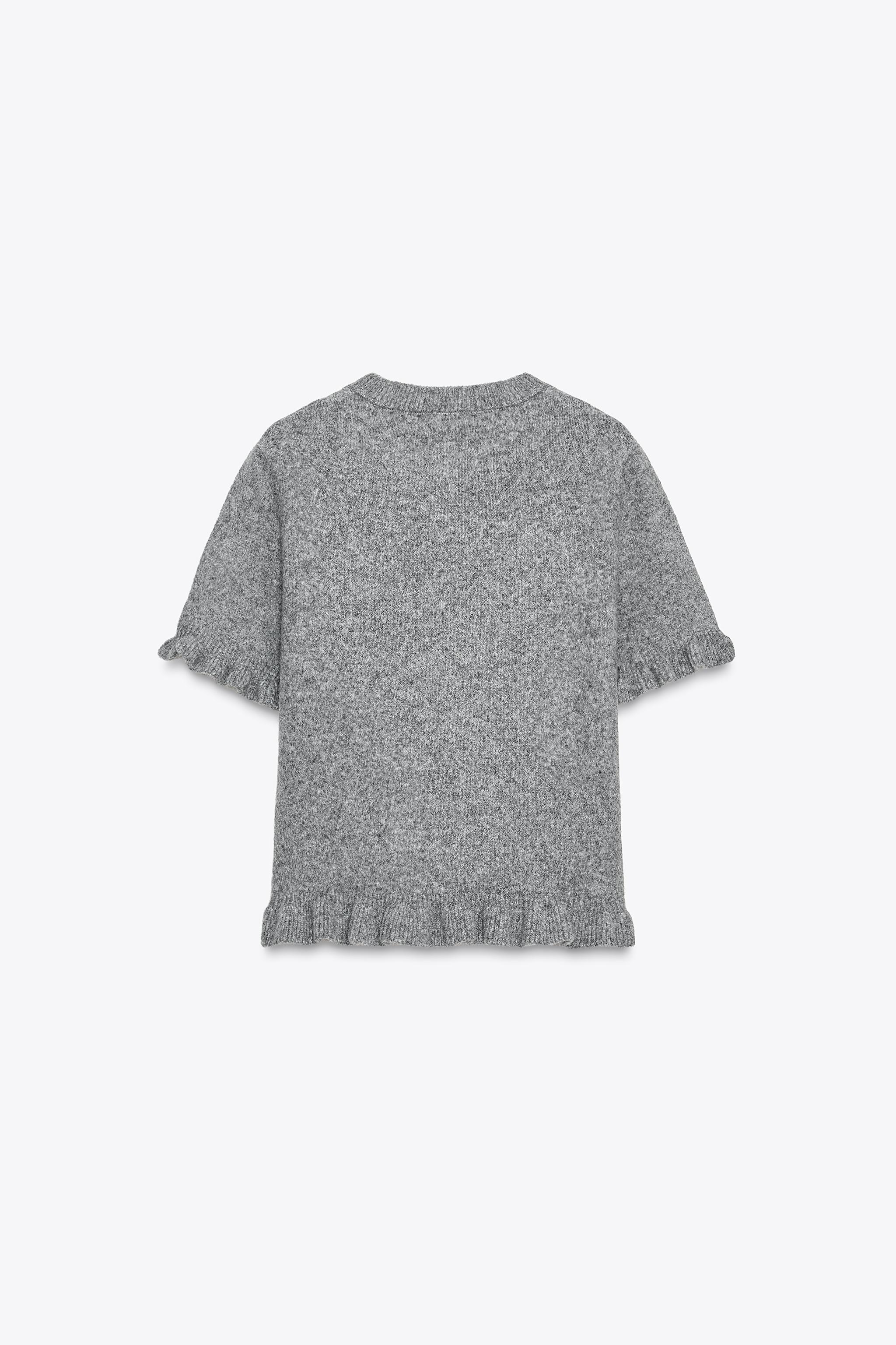 RUFFLED SHORT SLEEVE KNIT SWEATER
