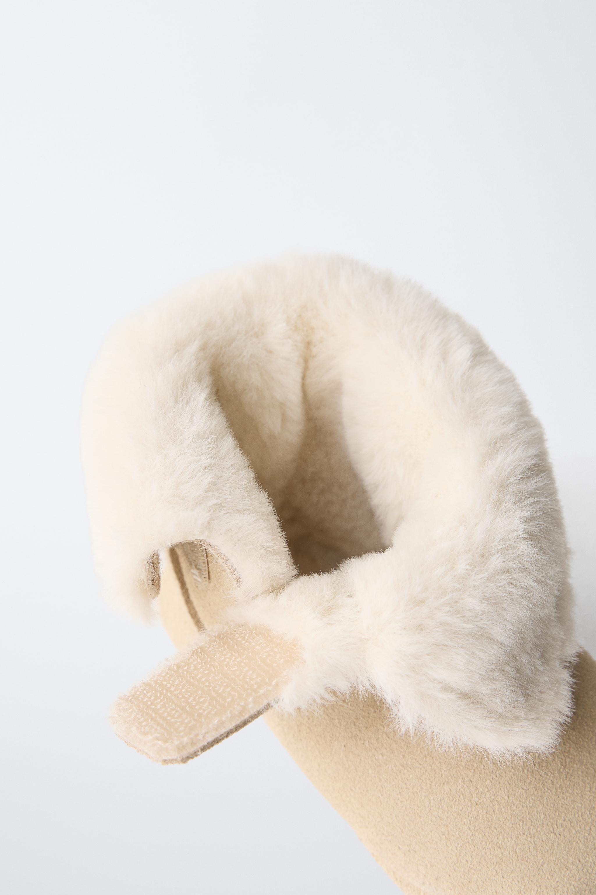 FUR-LINED LEATHER BOOTS