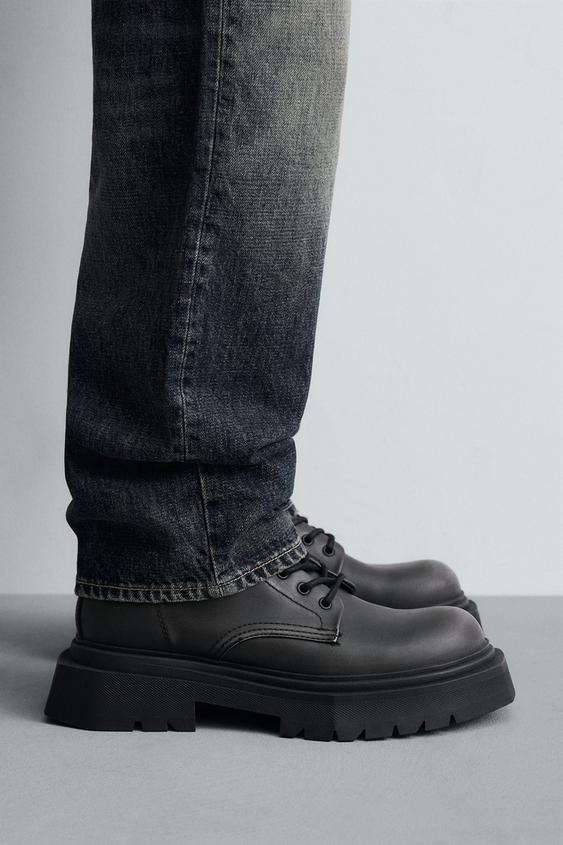 CHUNKY DISTRESSED LACE-UP BOOTS