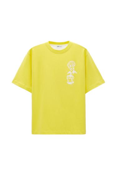Yellow T-shirt with a white graphic design of a skeleton on the chest. Straight cut and round neck. White background.