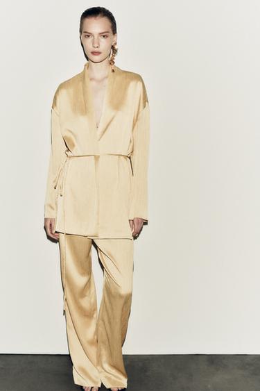 FINELY PLEATED PALAZZO TROUSERS - Pastel yellow by Zara