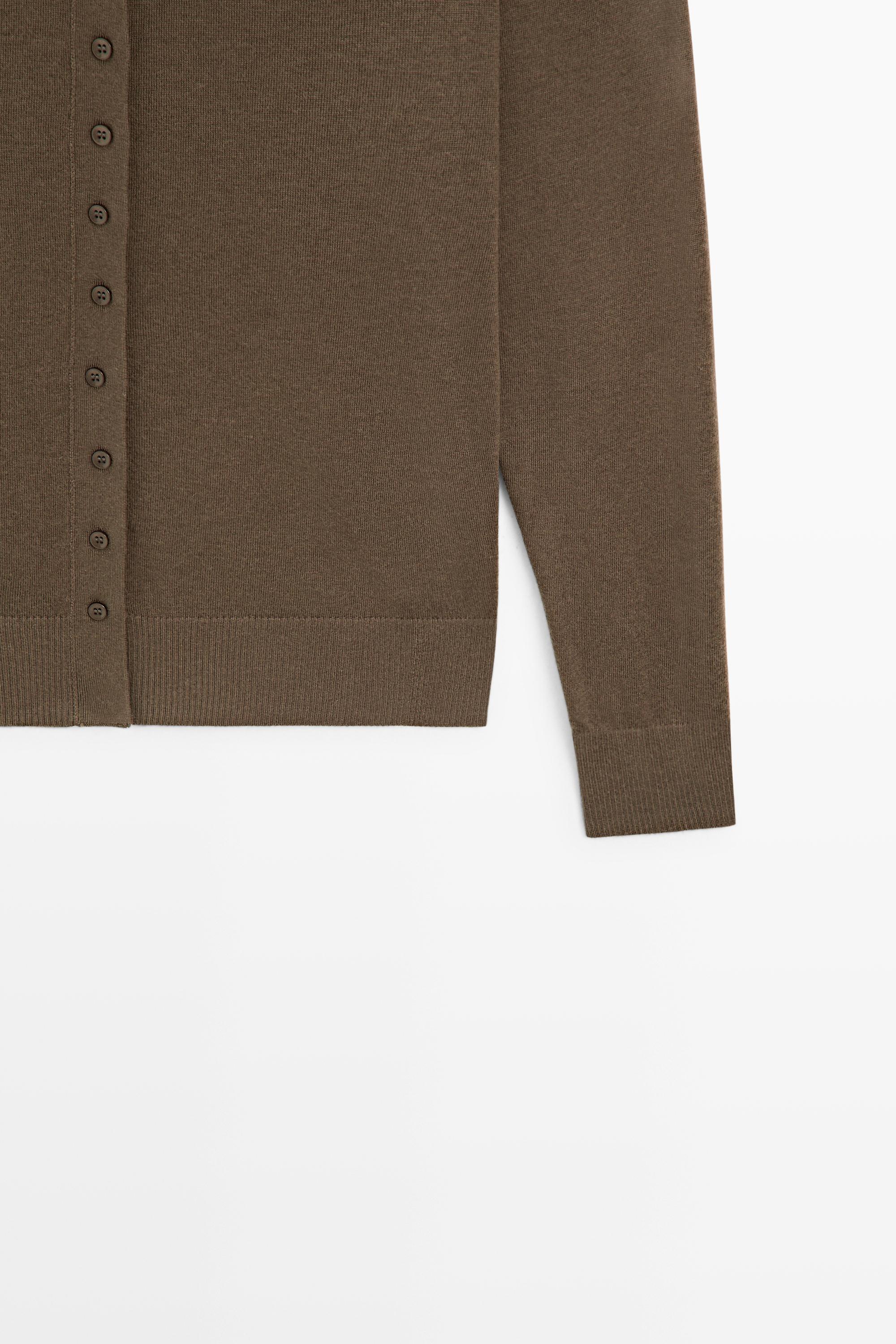 Turtleneck cardigan with button detail