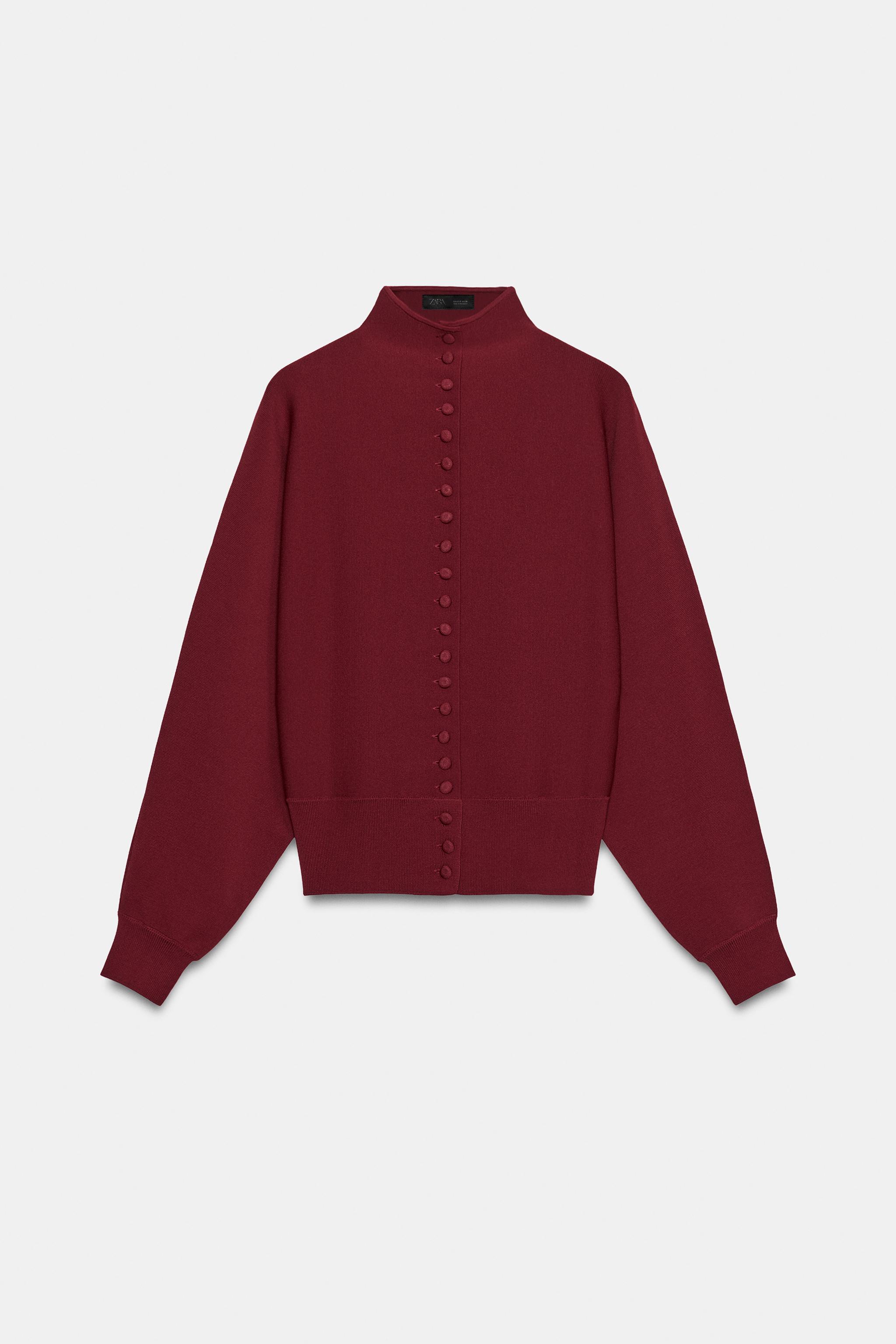 GILET EN MAILLE AVEC BOUTON REVÊTU