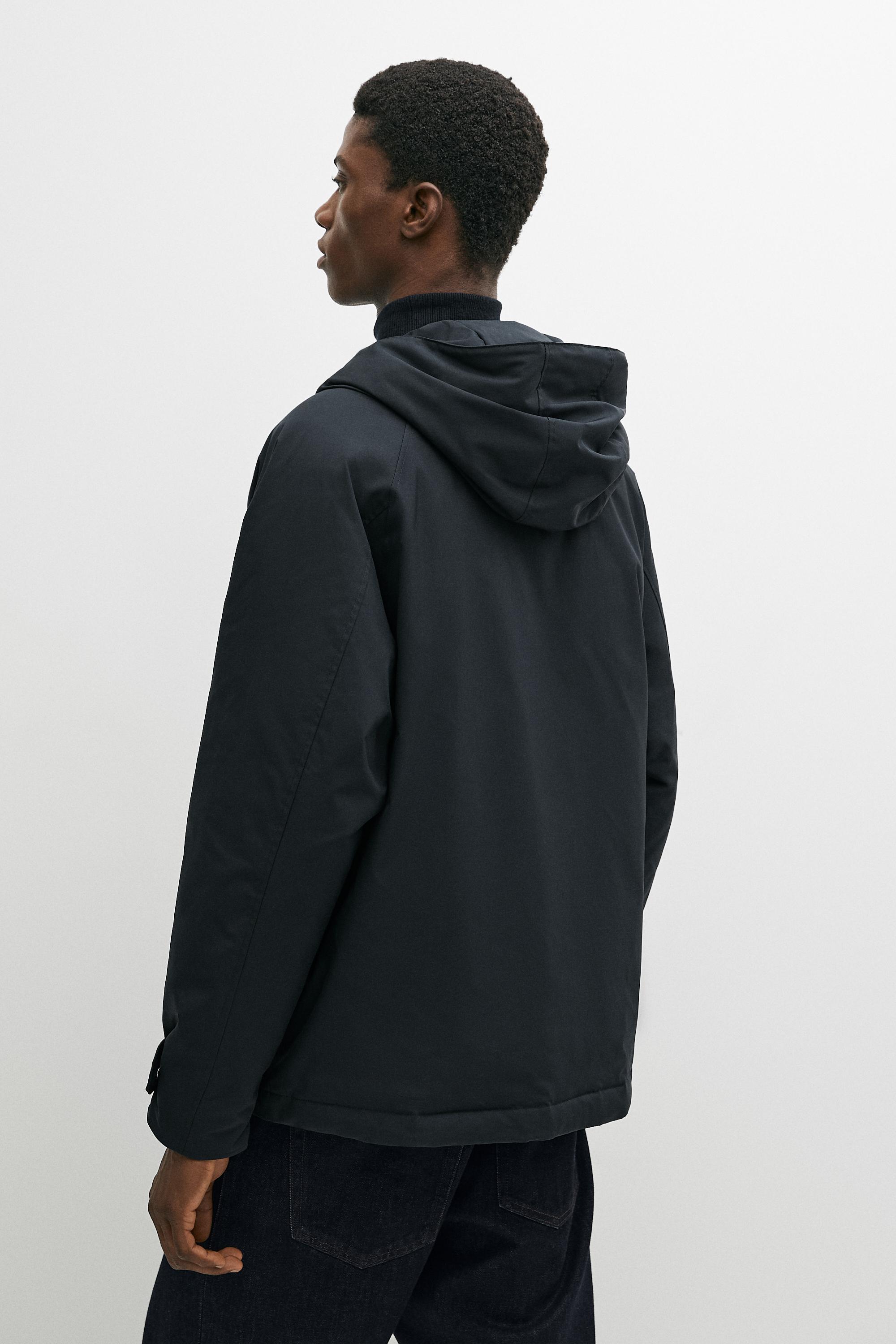 Short quilted parka with pocket details