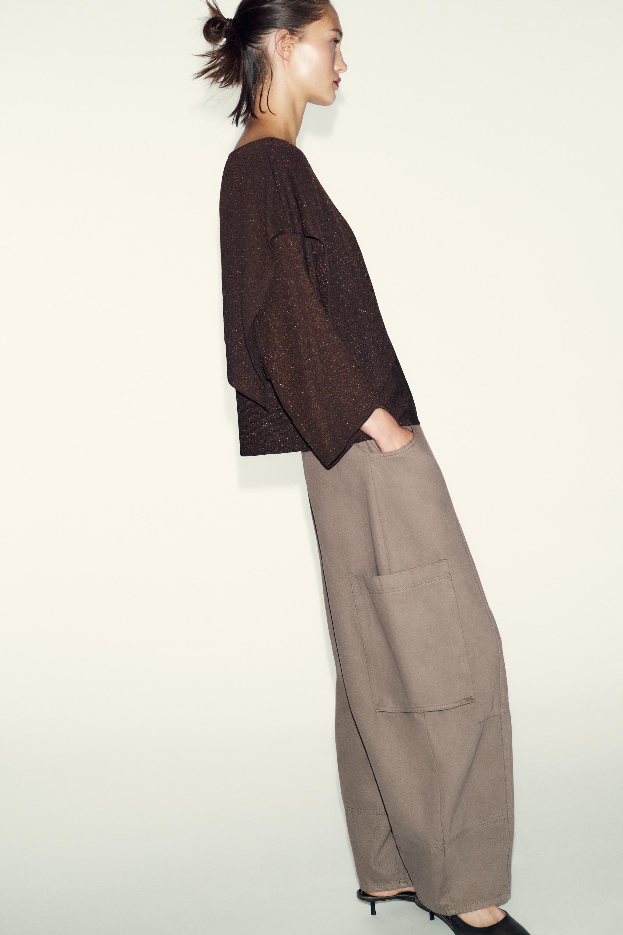 PULL CAPE EN MAILLE À FIL MÉTALLISÉ