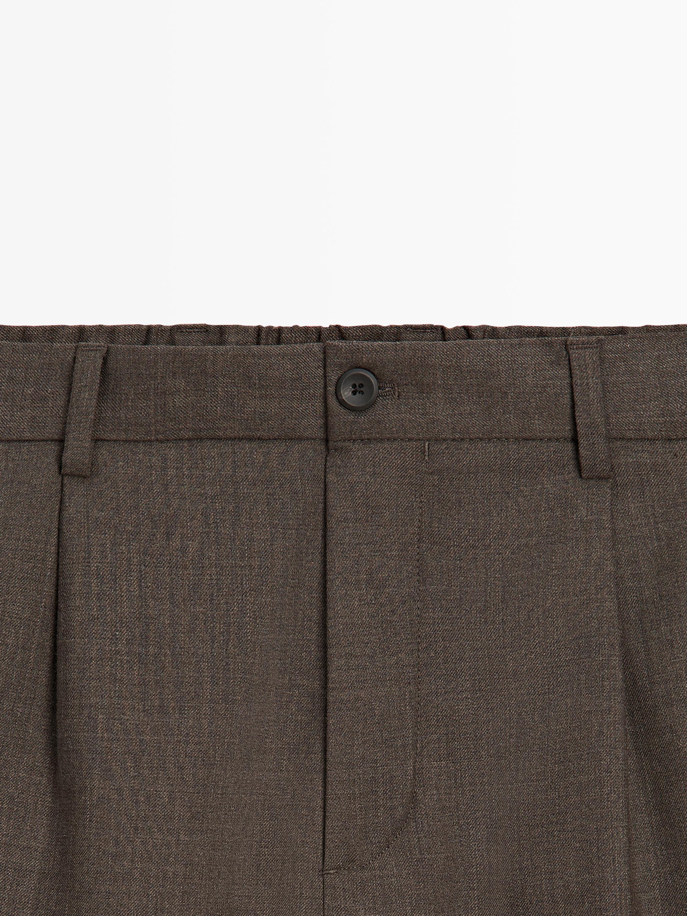 Pantalon à pinces en laine