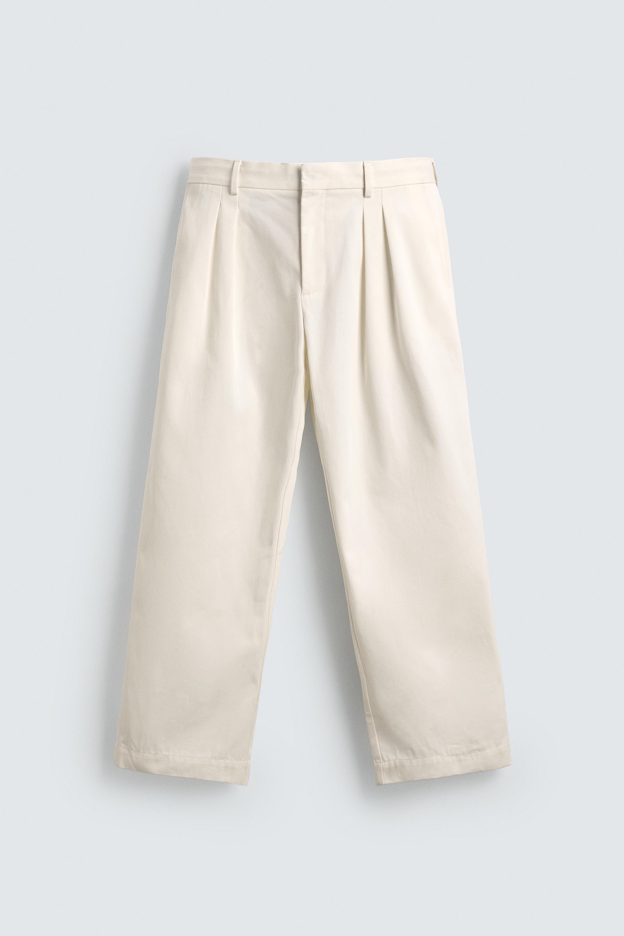 PANTALON CHINO À PLIS AARON LEVINE X ZARA