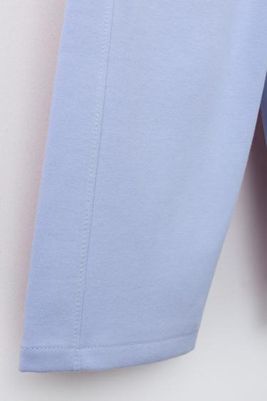 WIDE-LEG INTERLOCK TROUSERS WITH RAISED SLOGAN - Pastel blue by Zara - Image 3