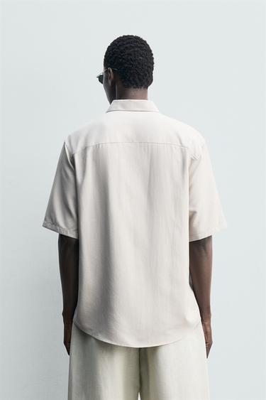 CHEMISE FLUIDE RELAXED FIT À POCHES - Gris perle de Zara - Image 2