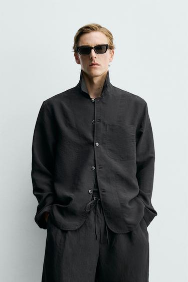 SOBRECAMISA FLUIDA JACQUARD RAYAS - Negro de Zara