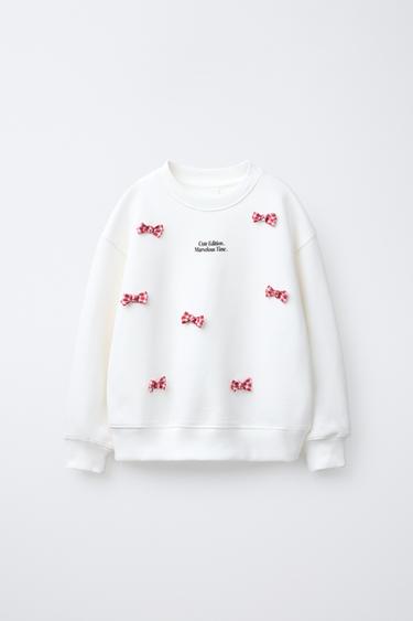 SWEAT À INSCRIPTION ET NŒUDS - Écru de Zara - Image 0