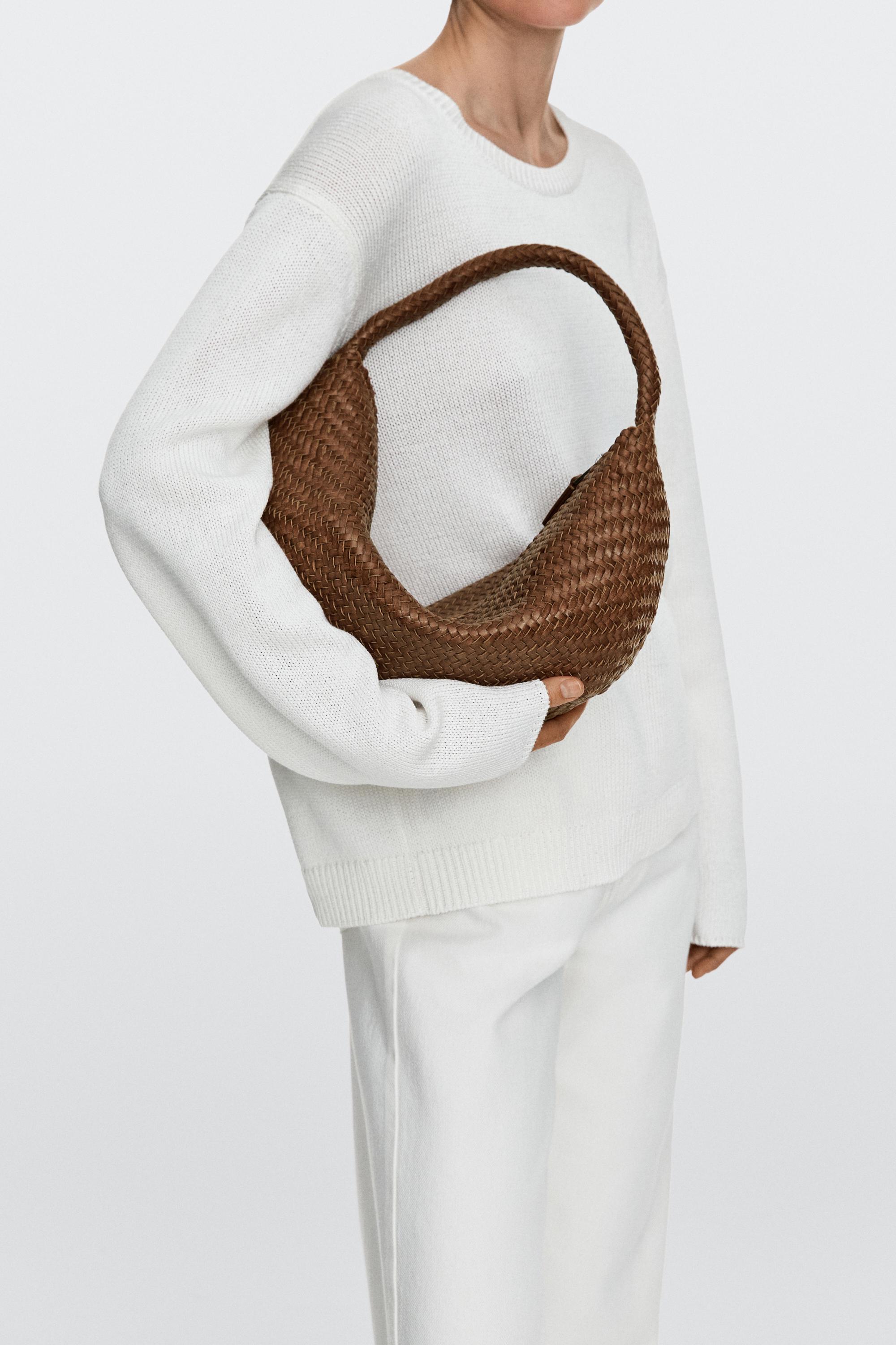 Sac demi-lune tressé cuir