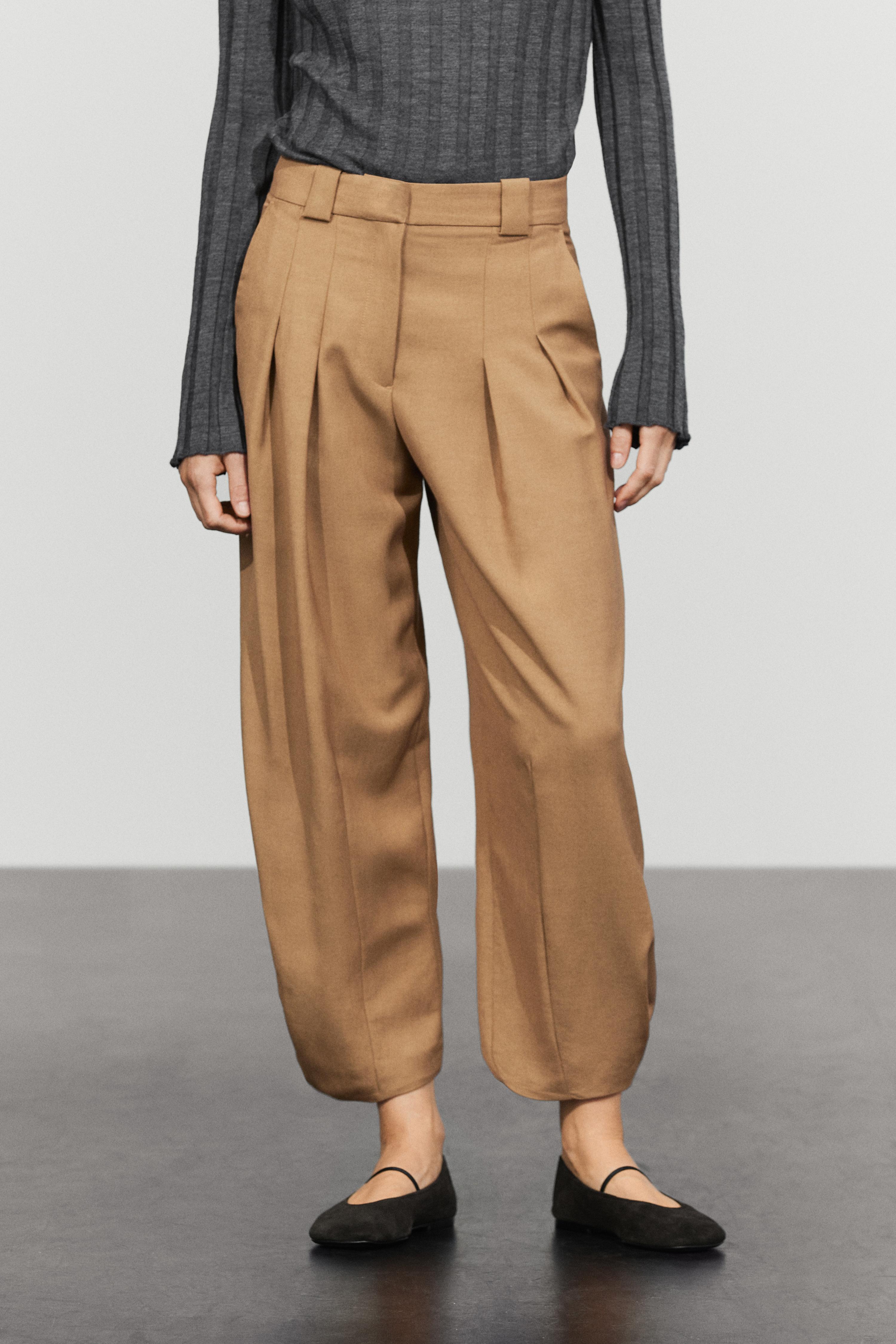 Wool blend pants with pleated detail