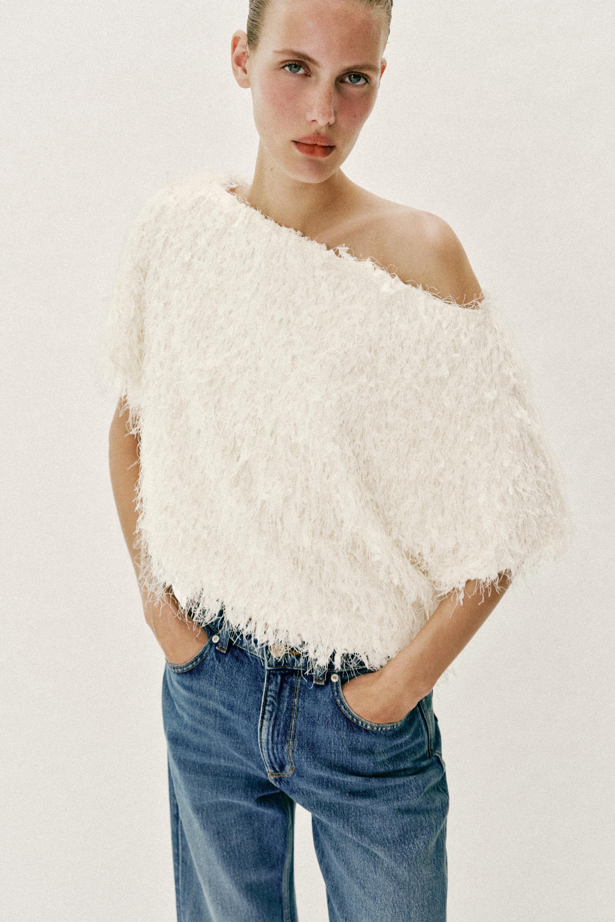TOP EN MAILLE FRANGES