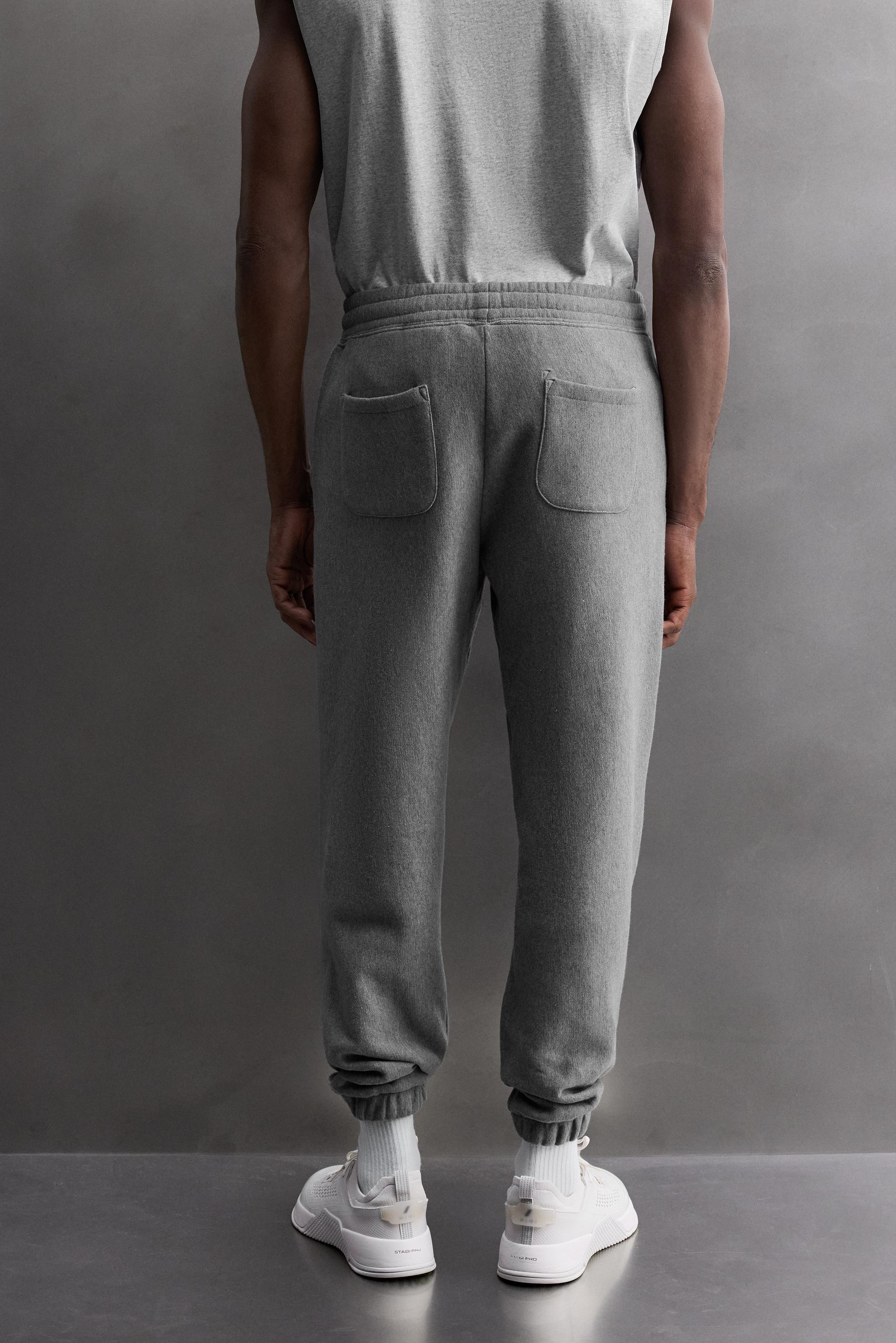 JOGGING PANTS WITH PRINTED TEXT