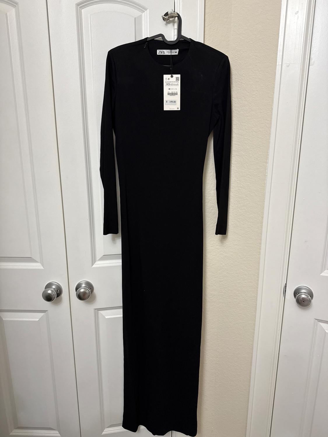 OPEN BACK DRESS LIMITED EDITION