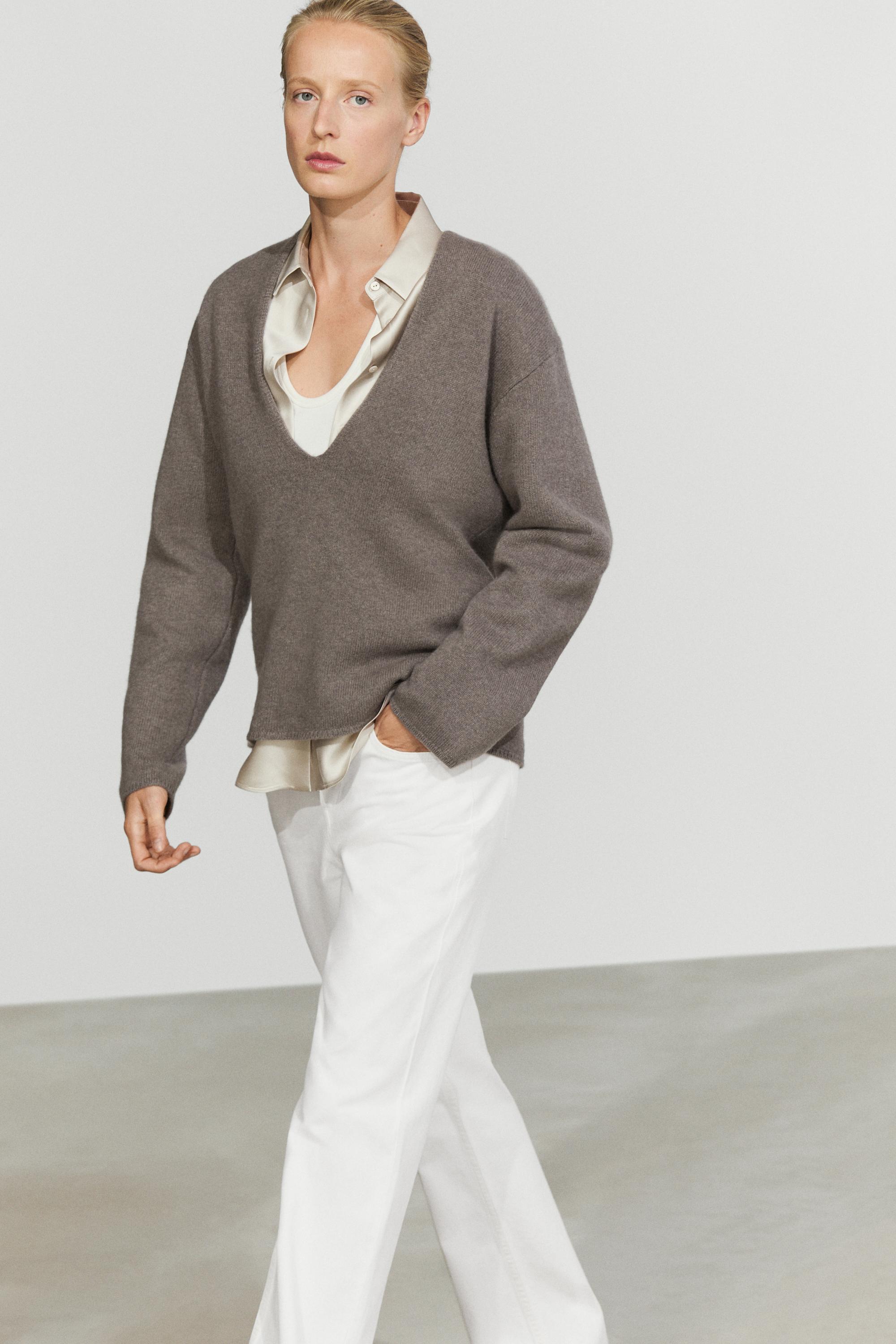 Long-line knit sweater with neckline detail — 211
