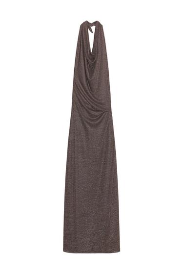 Rear view of a bronze maxi dress with no sleeves, halter neck with tie fastening, cowl neckline and open back.