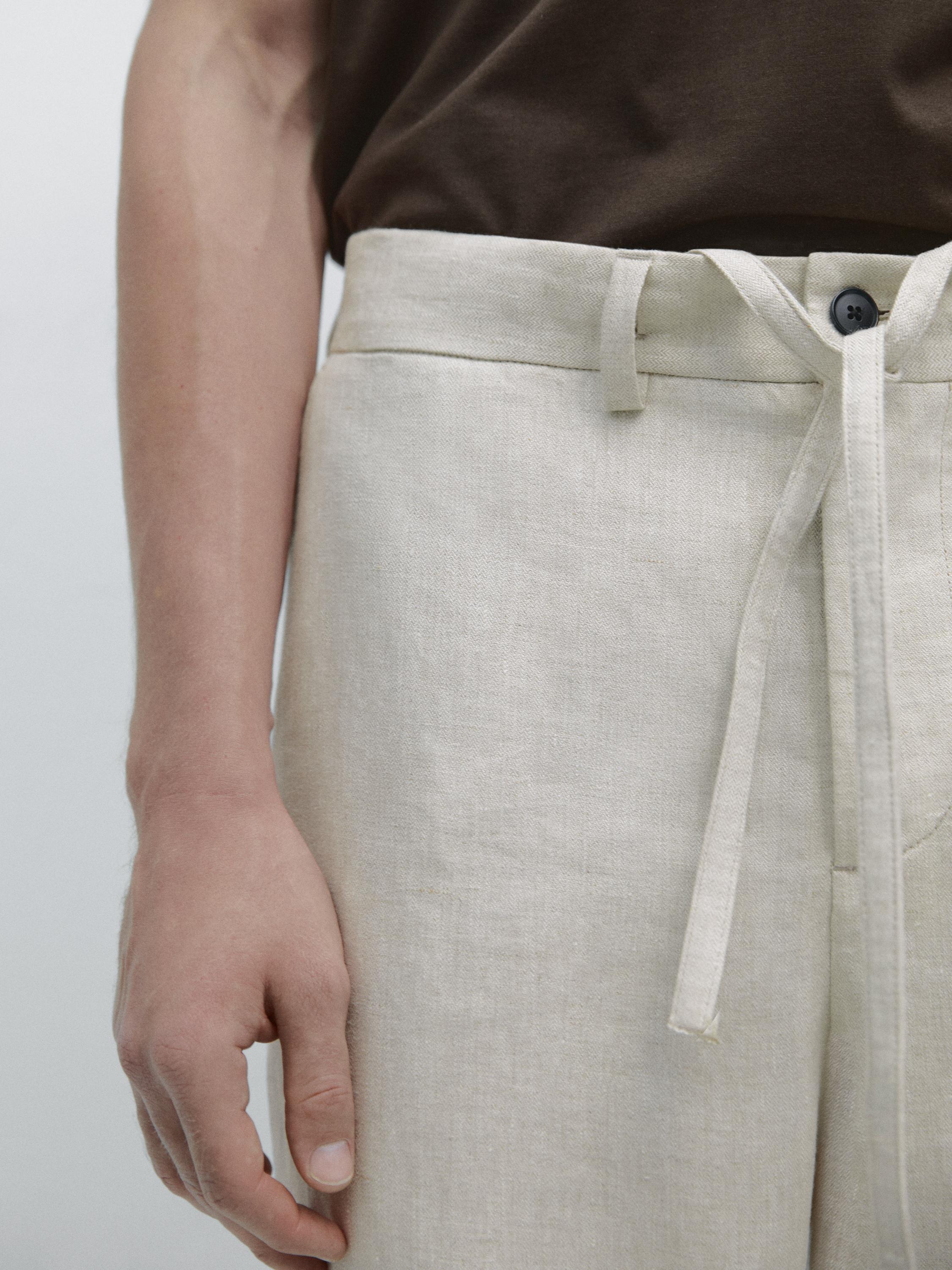 Lightweight linen trousers with herringbone detail