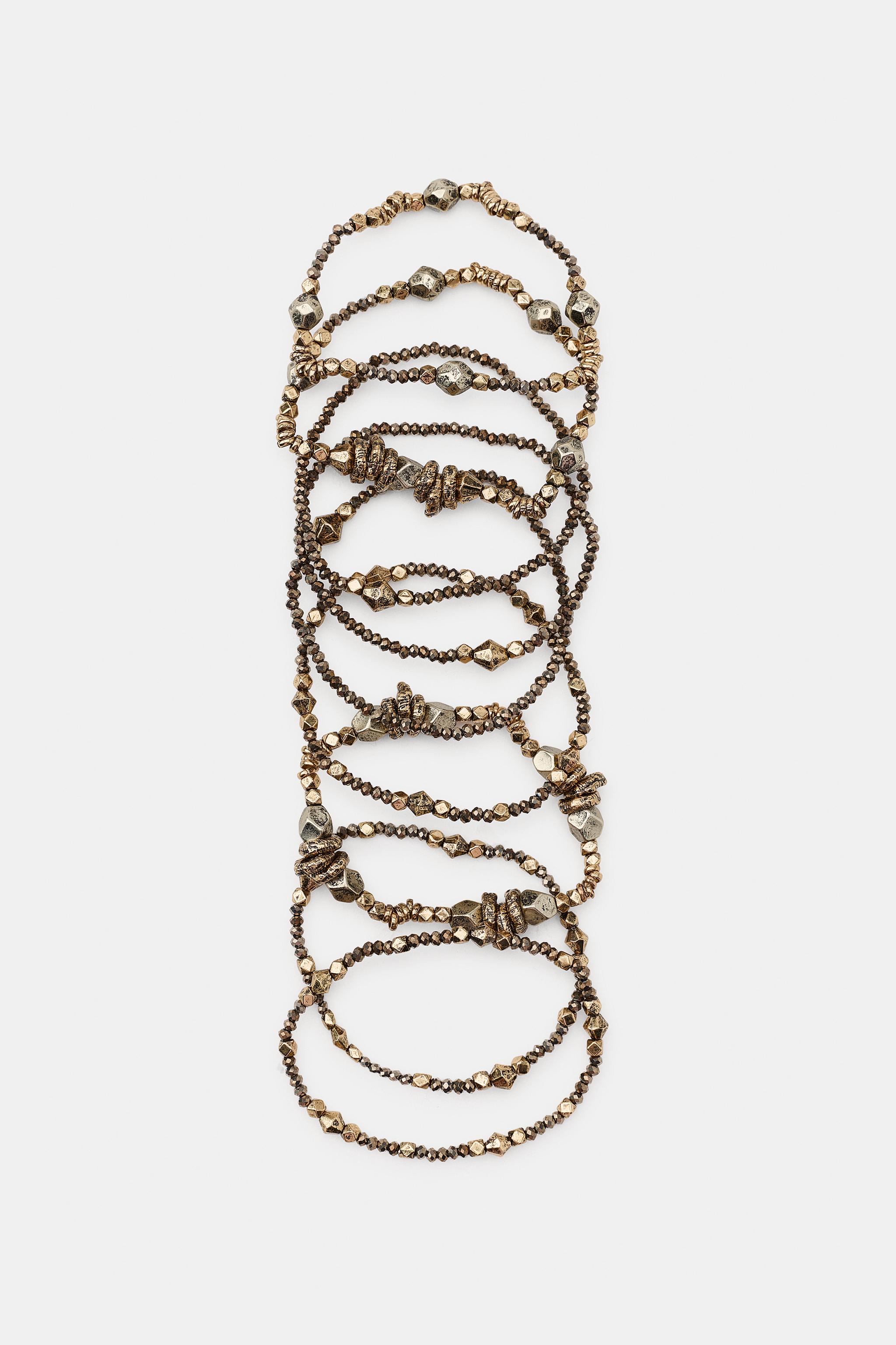 PACK OF 9 ELASTIC MIXED-METAL BRACELETS — Aged gold