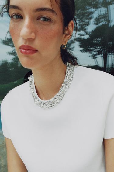 TOP IN MAGLIA CON PERLINE GIOIELLO - Bianco di Zara