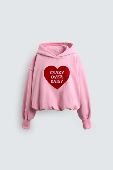 2-6 TUỔI/ ÁO NỈ IN CHỮ CÓ MŨ HARRY LAMBERT FOR ZARA X DISNEY - Màu hồng từ Zara