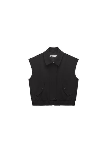CHALECO CUELLO CAMISERO BOLSILLOS