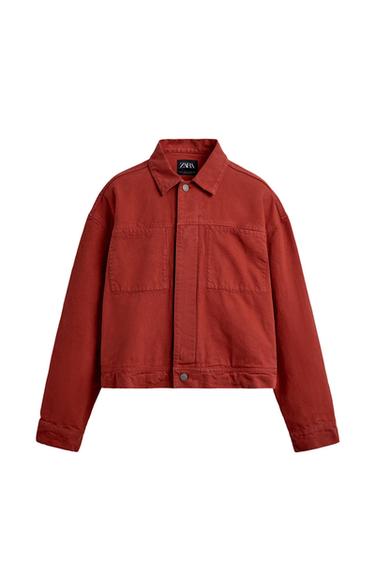 Red long-sleeved jacket with a collar, front pockets and button fastening against a white background. Label with the text ZARA.