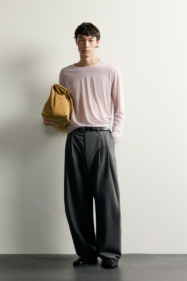 RELAXED FIT PLEATED TROUSERS