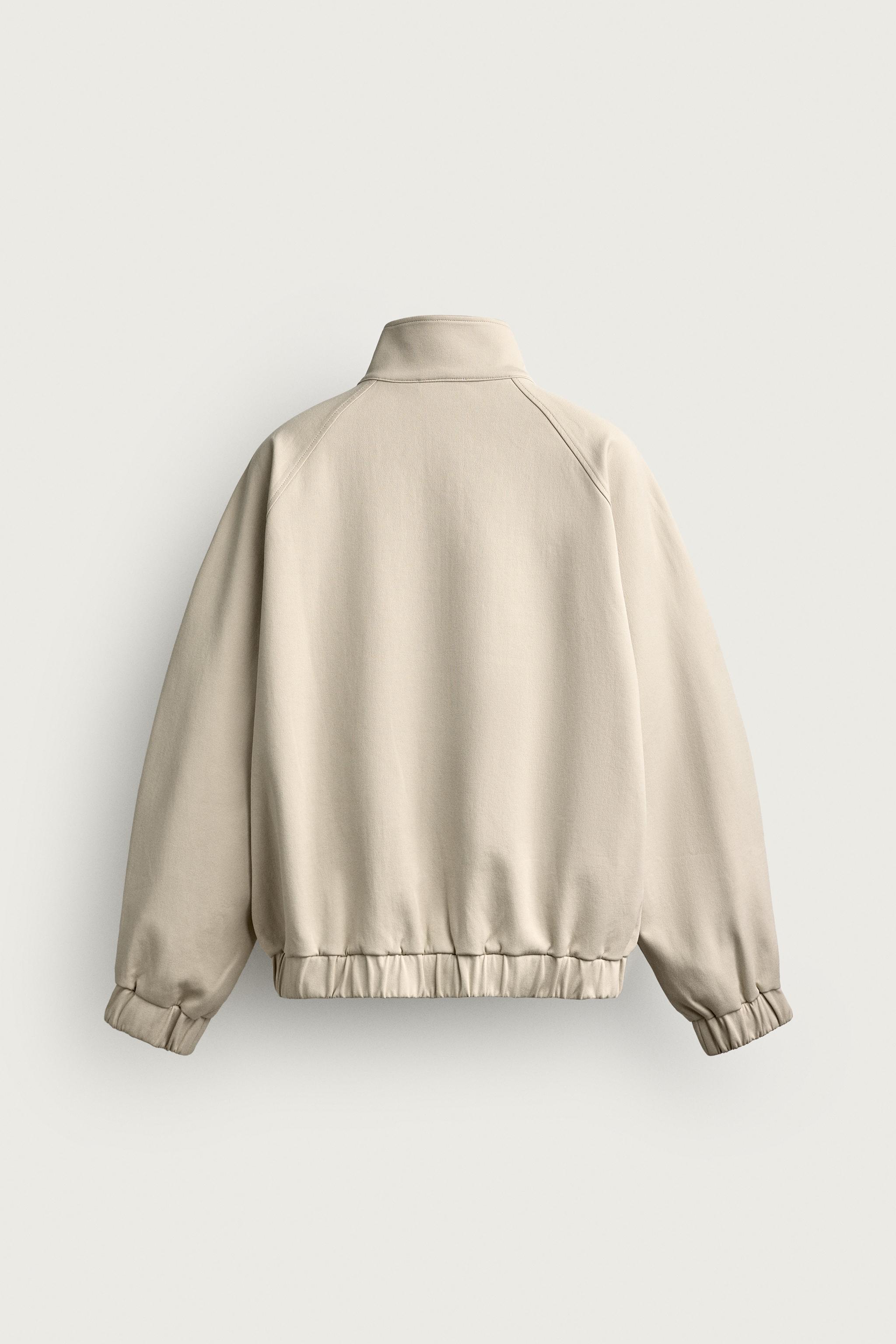 TECHNICAL POUCH SWEATSHIRT