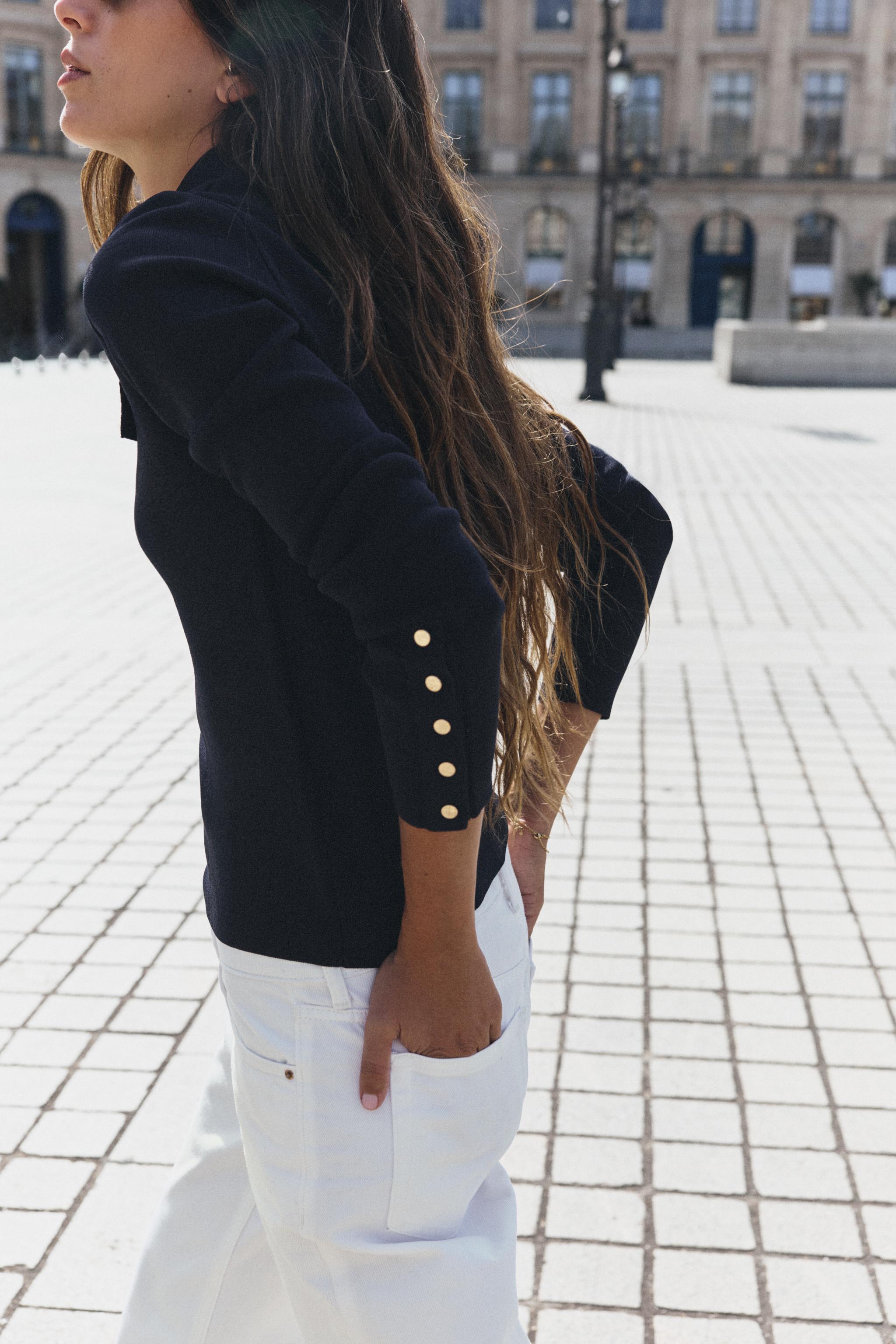 POLO EN MAILLE À PATTES DE BOUTONNAGE