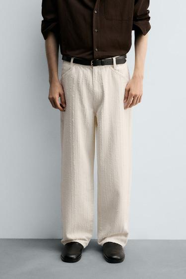 JEANS RAYAS TEXTURA - Blanco roto de Zara