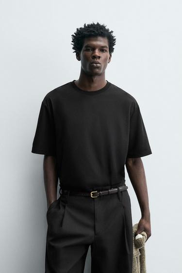 تيشرت تقني بهيكل بيكيه - أسود الخاص بـ Zara