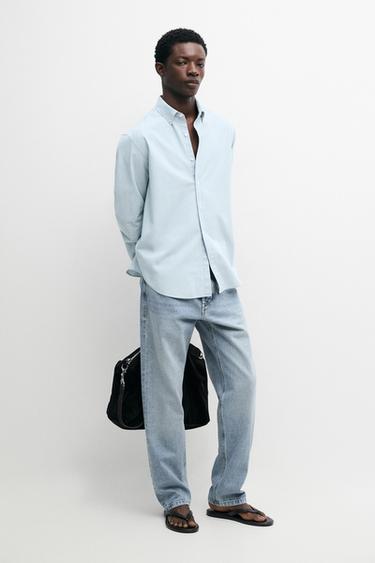 Chemise slim en denim 100 % coton - Bleu ciel de Zara - Image 0