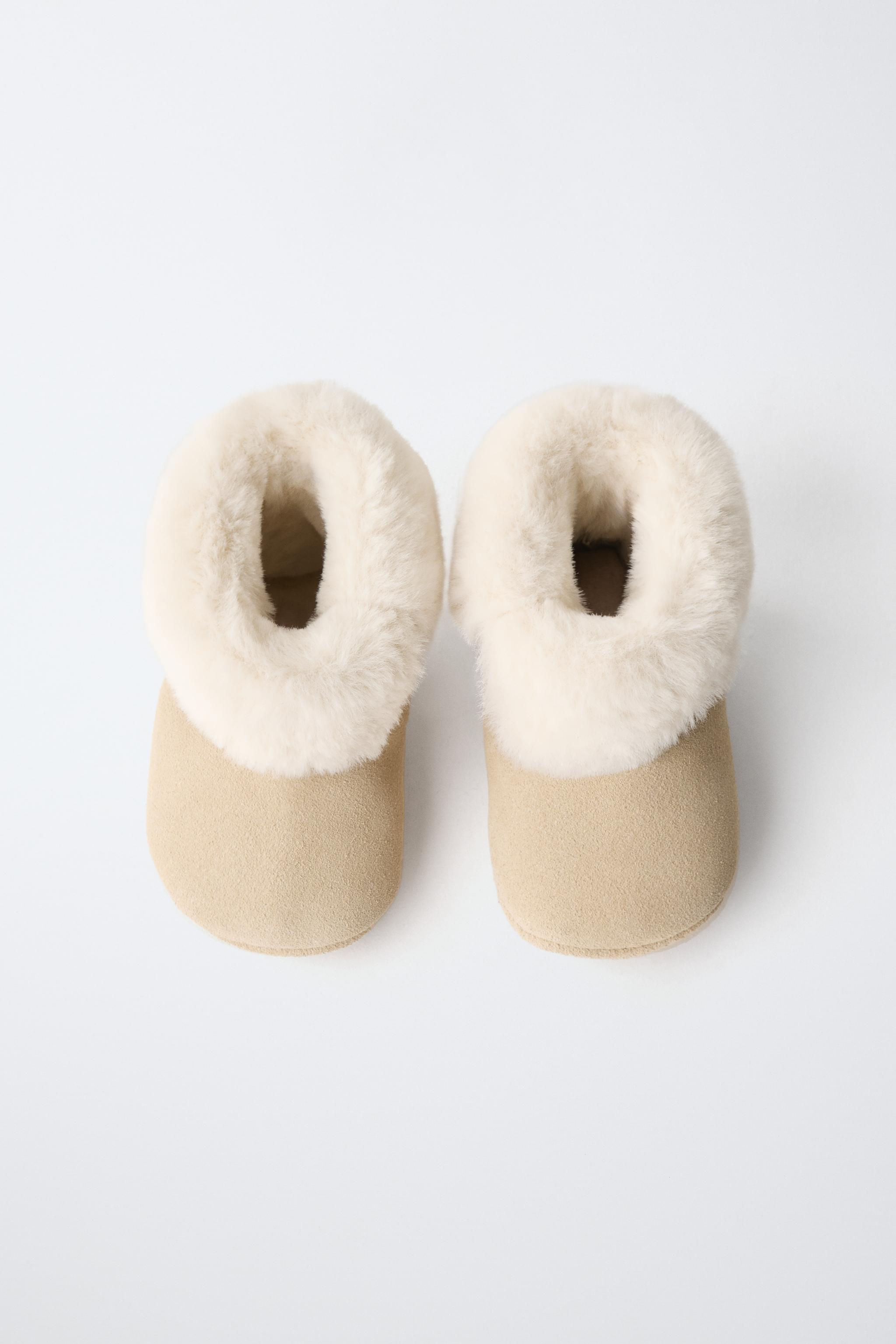 FUR-LINED LEATHER BOOTS