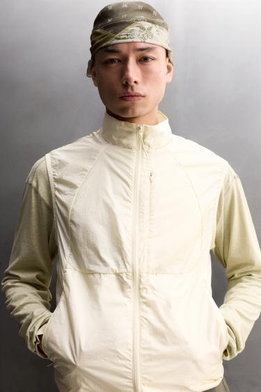 LIGHTWEIGHT TECHNICAL VEST — Bone 1