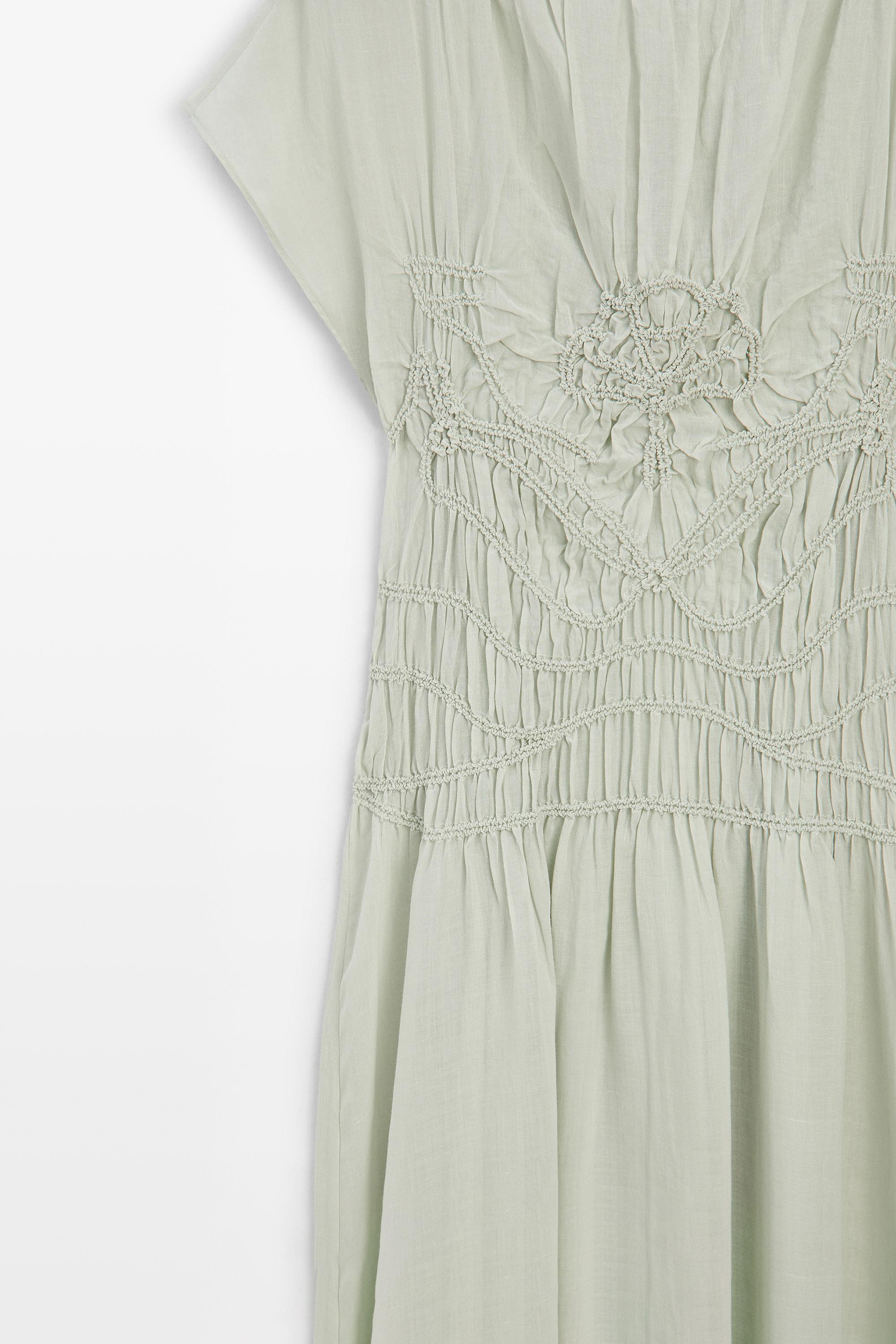 Long flowing dress with embroidered details