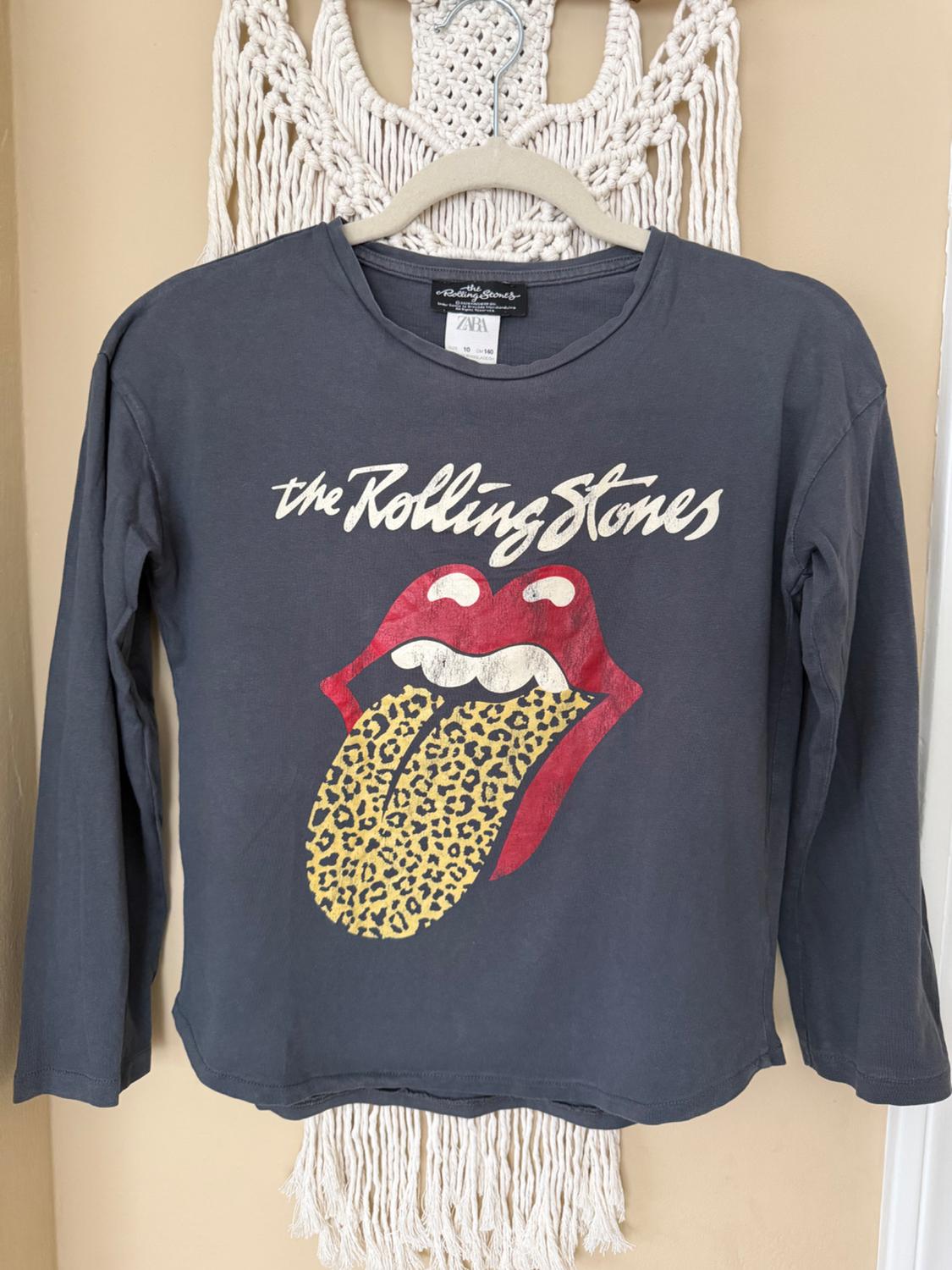 Gray long-sleeved t-shirt with a leopard print lips and tongue design. It features the text "The Rolling Stones" at the top.