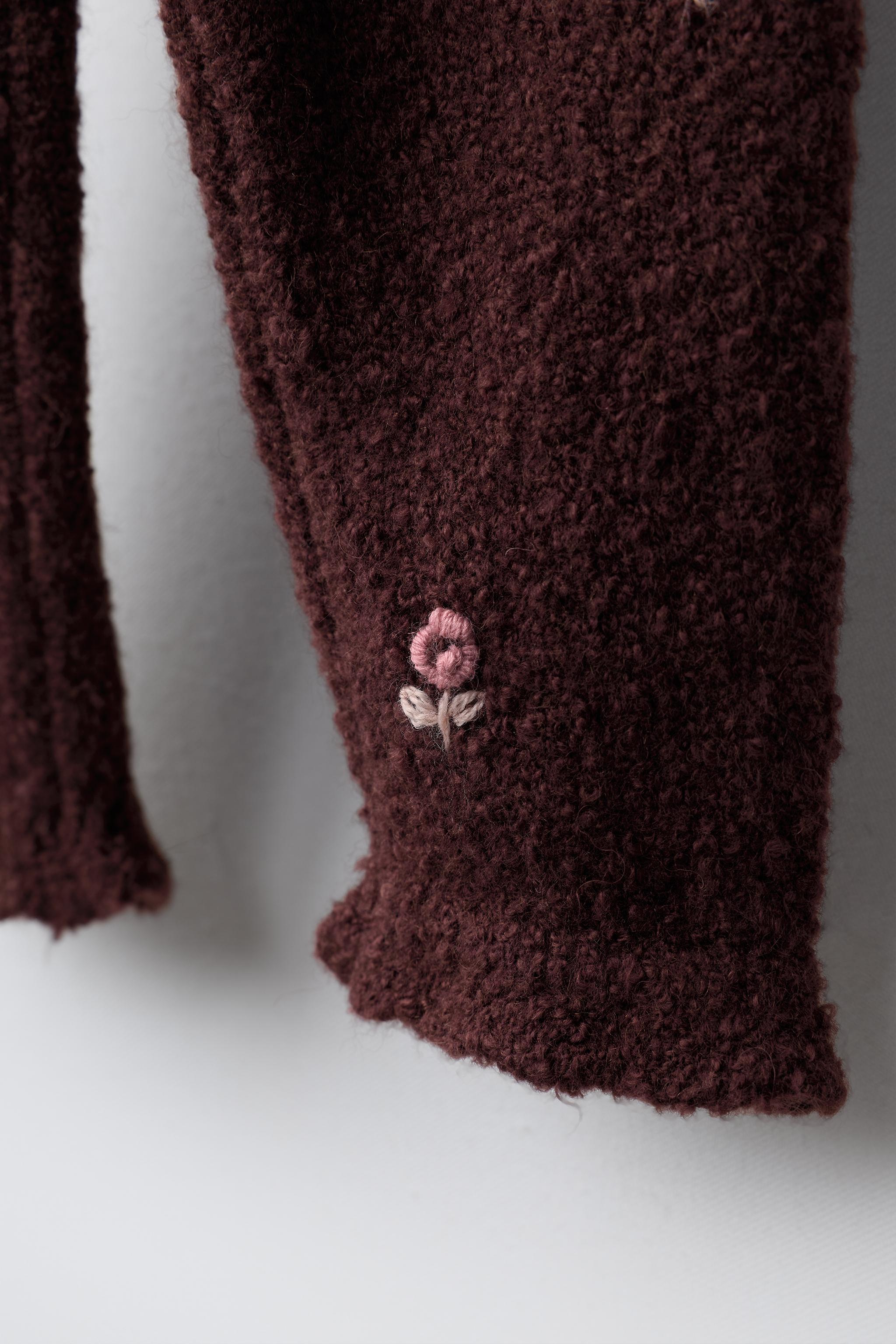 KNIT PANTS WITH RUFFLE HEM AND DOT DETAIL