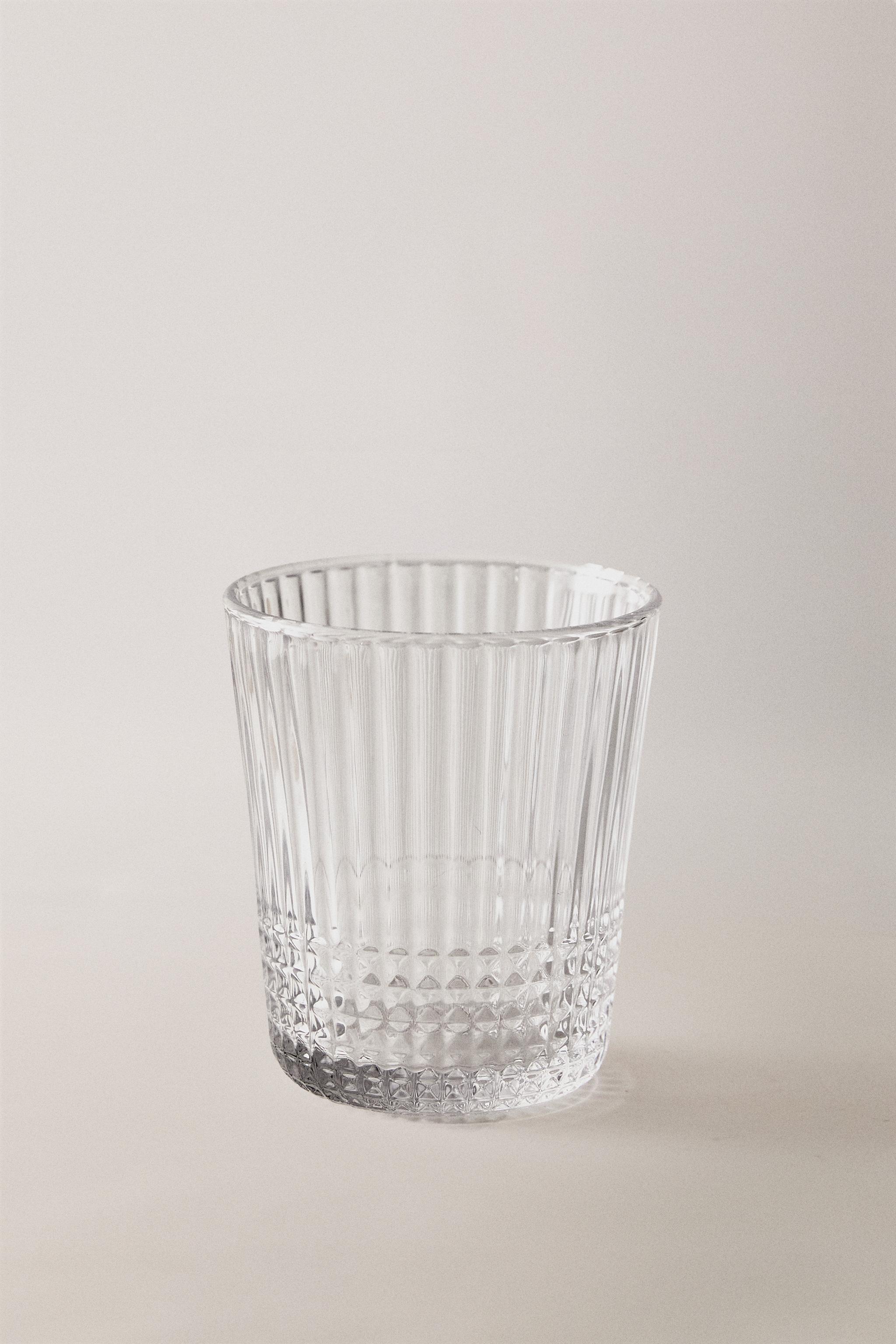 GLASS TUMBLER WITH RAISED GEOMETRIC DESIGN — Transparent