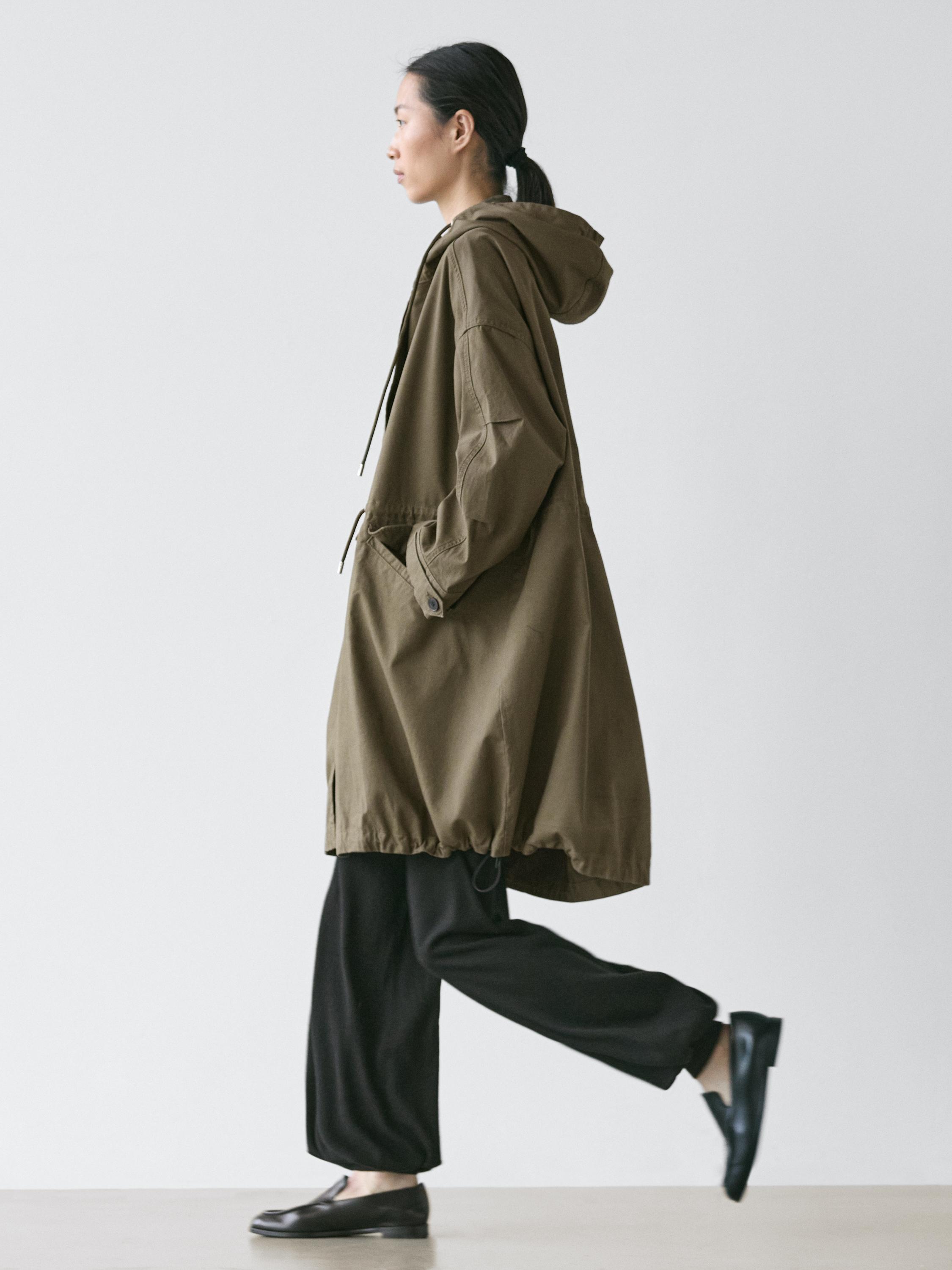Technical fabric trench coat with hood