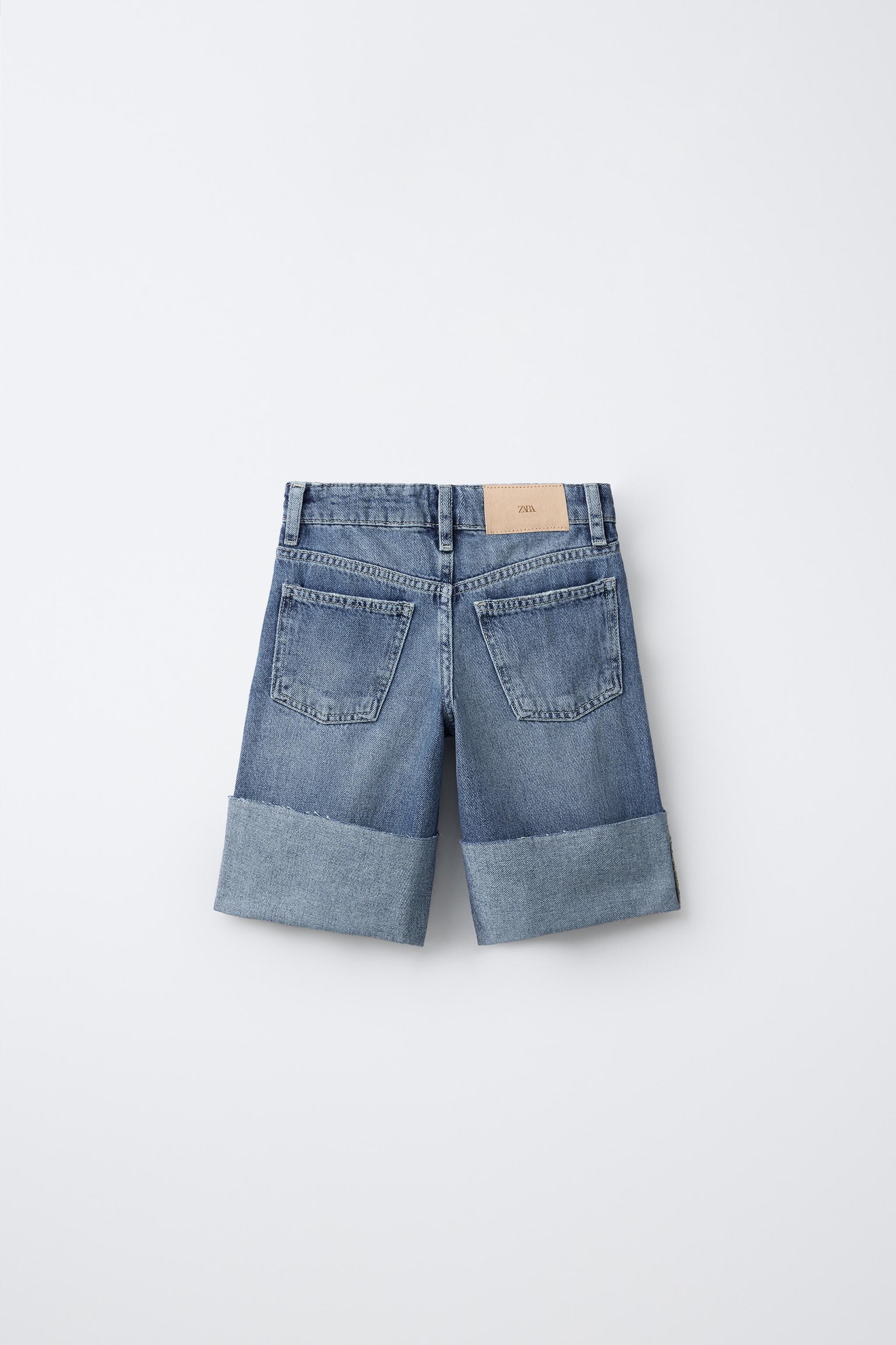 SHORT EN JEAN LONG DÉCHIRURES
