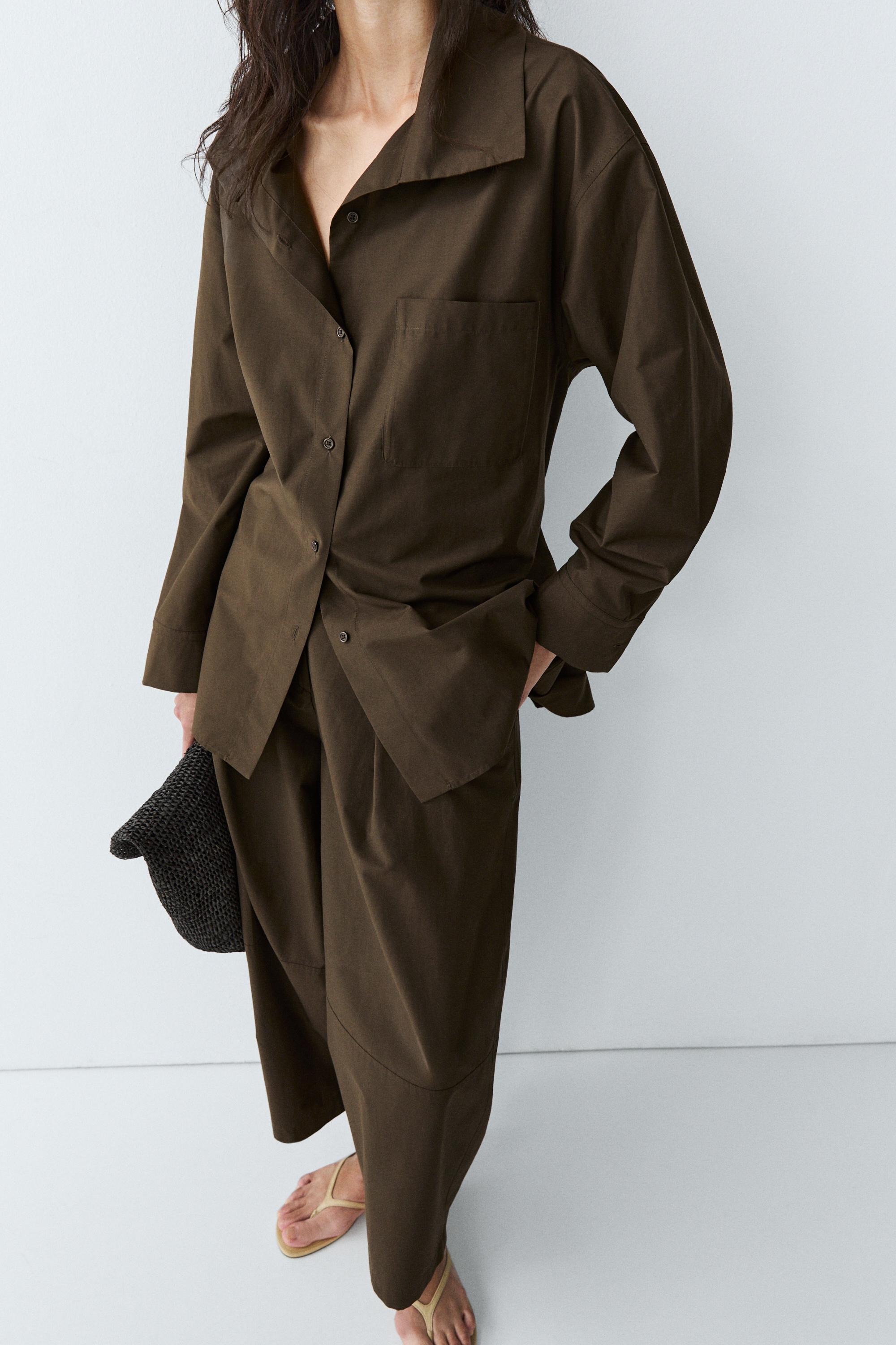 High collar overshirt with buckle detail