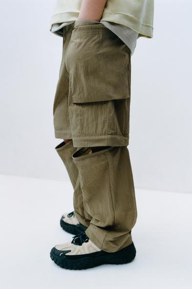 PANTALÓN NYLON DESMONTABLE BERMUDA - Oliva de Zara - Imagen 0