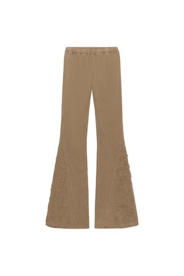 WASHED-EFFECT FLARE TROUSERS WITH STUDS - camel by Zara