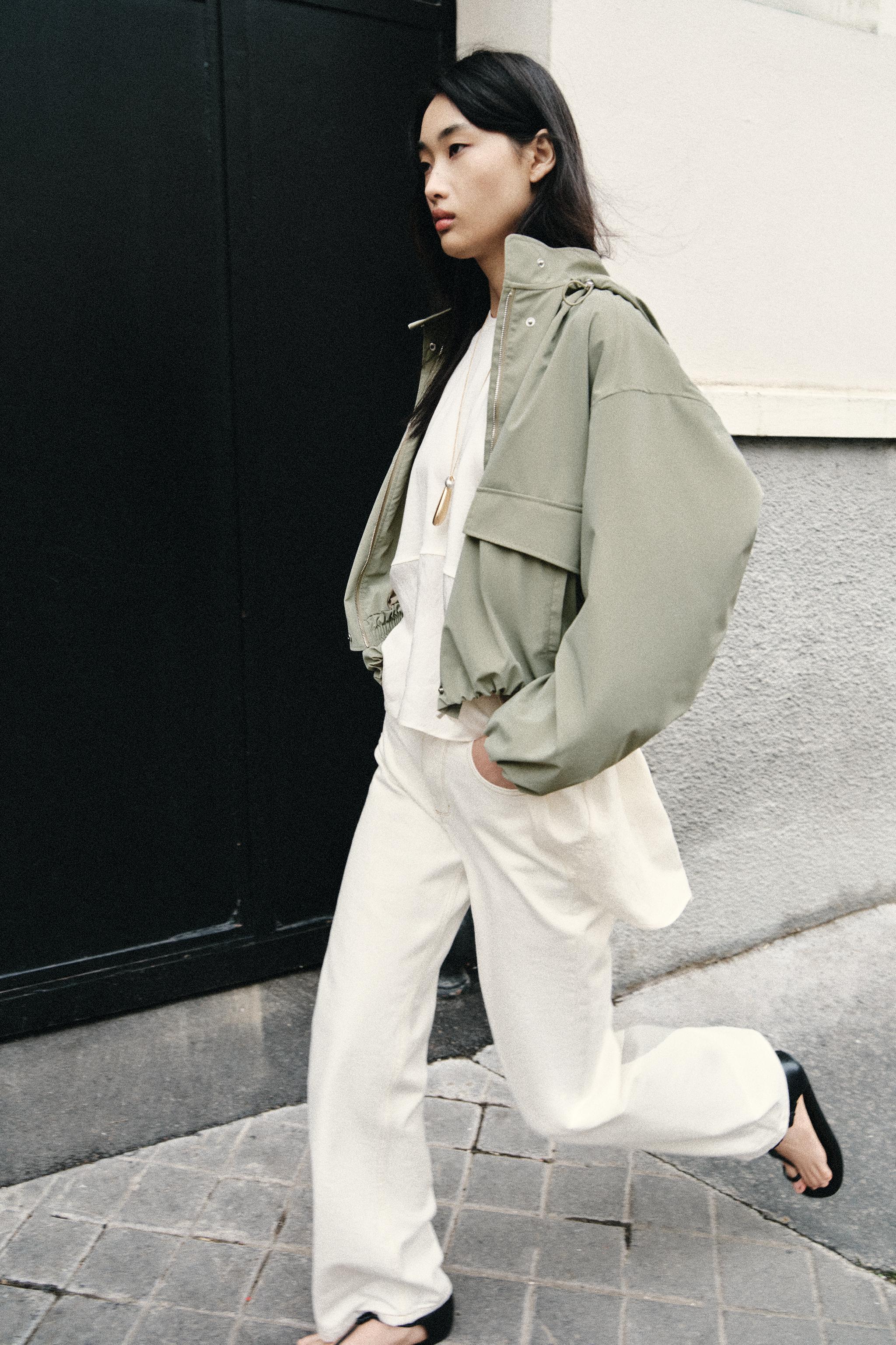 BLOUSON ENGOMMÉ À CAPUCHE