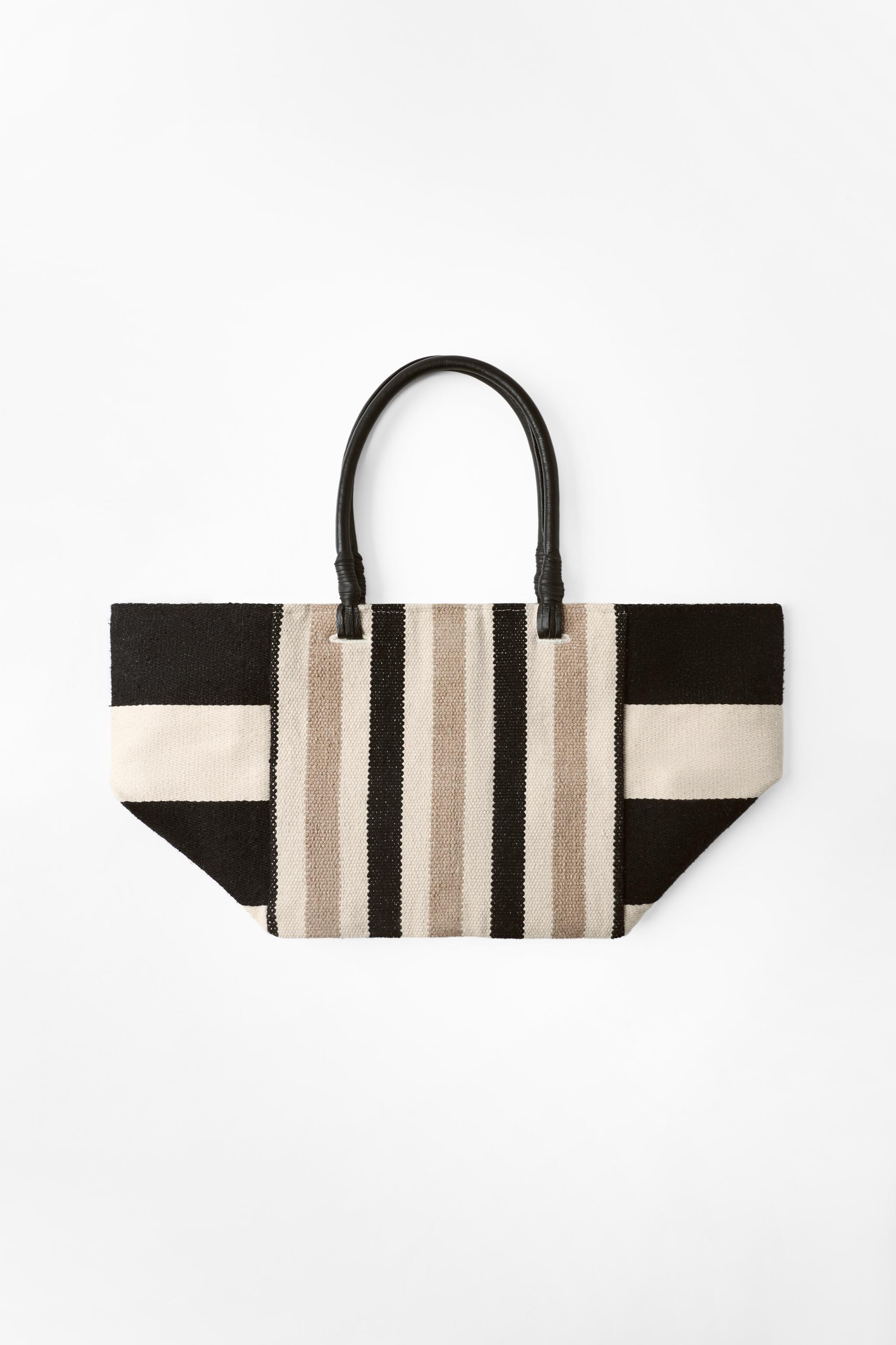 STRIPED BAG WITH LEATHER HANDLES