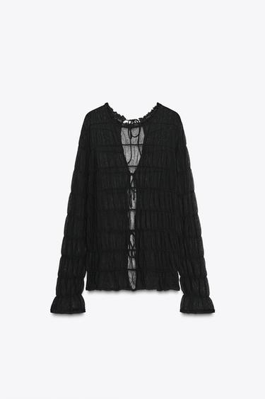 بلوزة محبوكة شبه شفافة بزمات - أسود الخاص بـ Zara