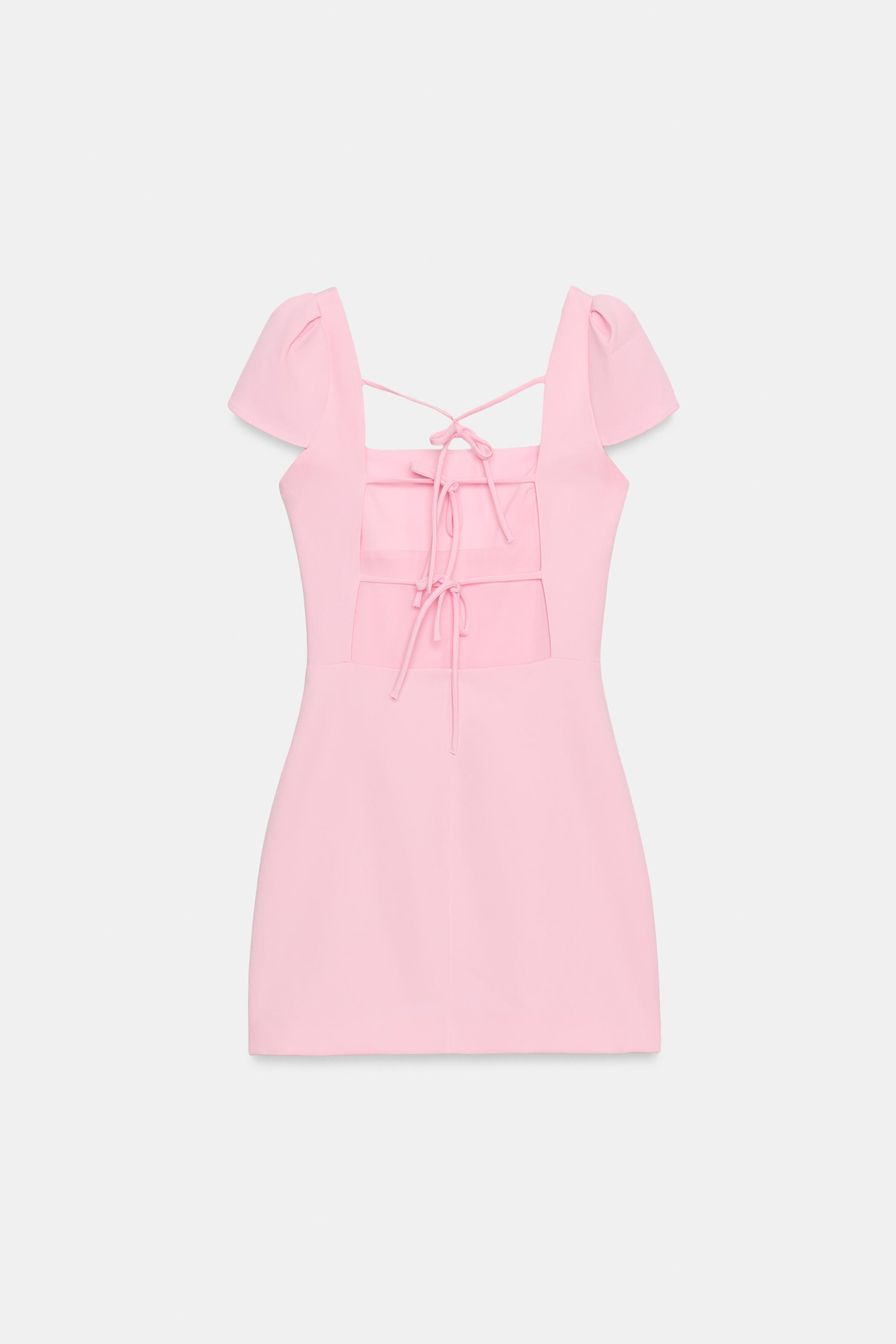 ROBE MINI À NŒUDS AU DOS ET POIS